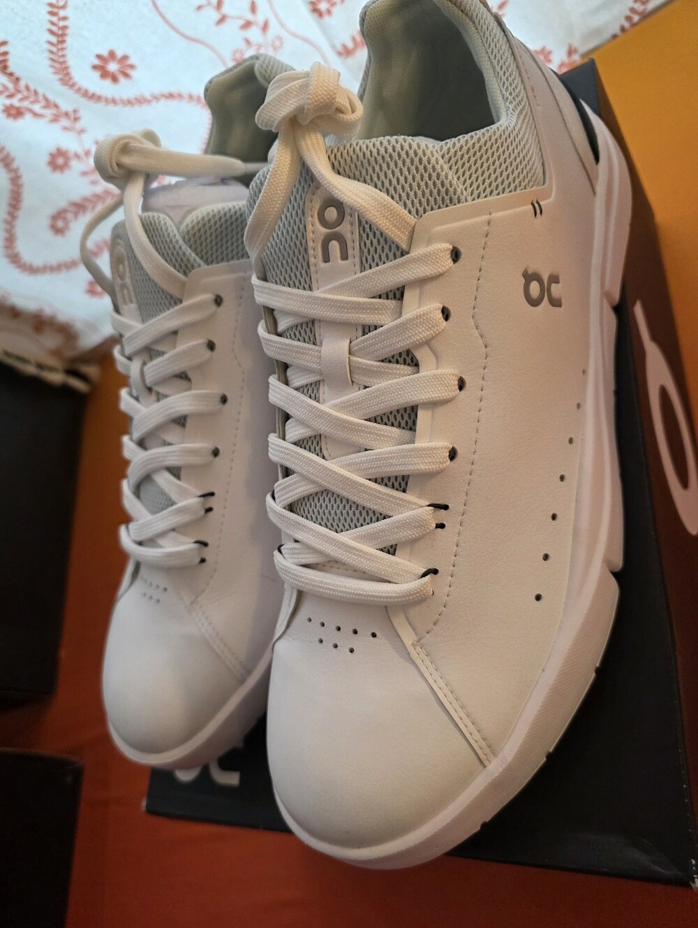 ON Cloud Roger Advantage Sneakers in White And Light Mint Green.